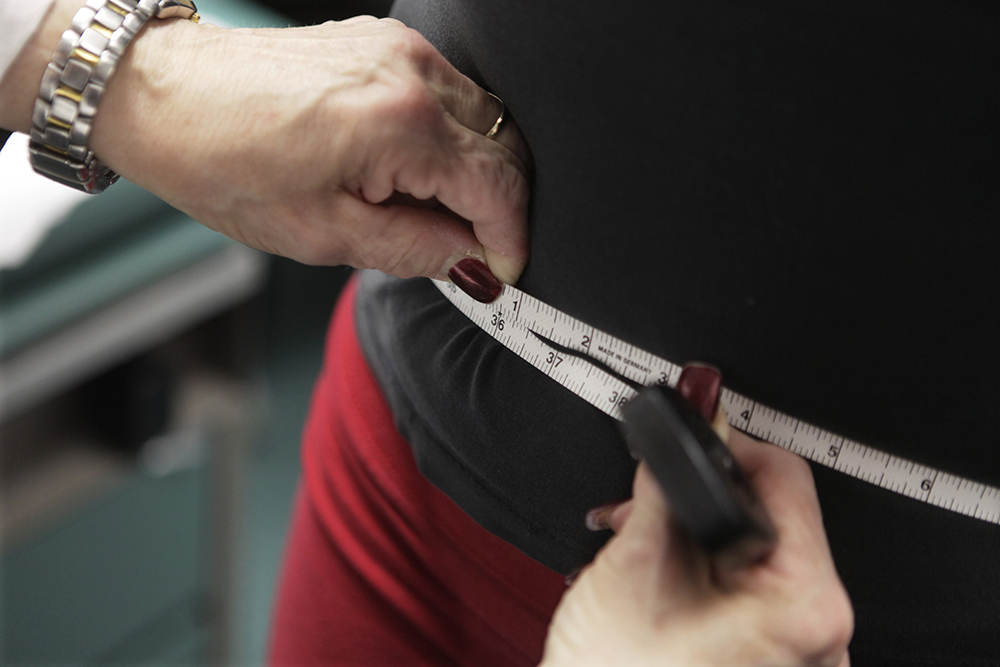 A study published Wednesday, April 5, 2017 in the New England Journal of Medicine suggests gaining and losing weight repeatedly may be dangerous for overweight heart patients. (AP Photo/M. Spencer Green, File)