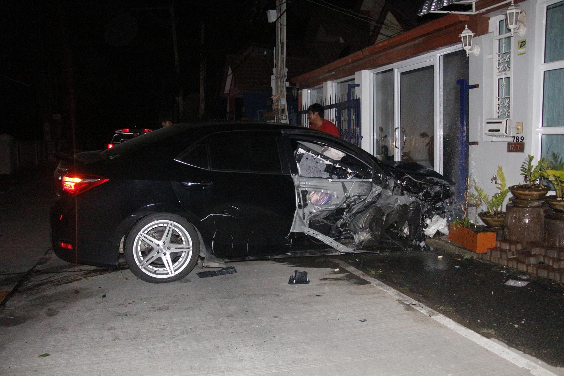 Nongprue police are searching for the driver of this car after the driver downed two power poles and fled the scene.