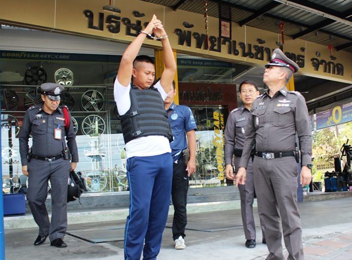 Kamol Tukcharoen was taken for a crime re-enactment outside Naklua’s Yanyon shop on Sukhumvit Road.