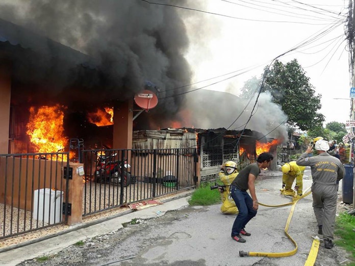 An elderly woman was injured and her Pattaya house destroyed by a gas fire that began when she put the kettle on for coffee. (PM photo courtesy of the Pattaya Fire Police)