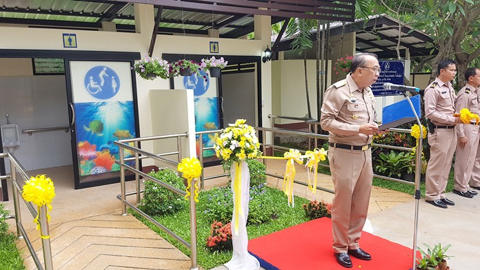 Rear Adm. Eagarat Promlumpug, commander of the Air and Coastal Defense Command, which runs the Sea Turtle Conservation Center, announces the opening of modern restrooms for the disabled there.
