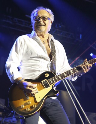Mick Jones of the band Foreigner is shown performing in this July 3, 2014 file photo. (Photo by Owen Sweeney/Invision/AP)