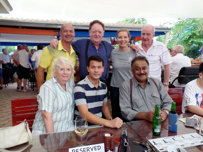 Andre, Allan, Linda and Dr Iain Corness pose for a photo with Foo Smith, Pasit, and Peter Malhotra.