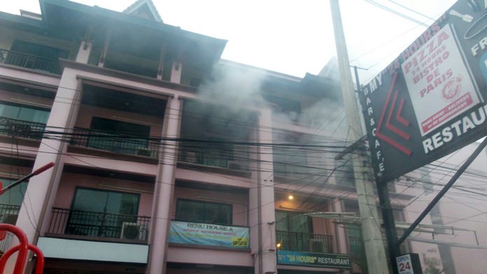 Two people were injured in a fire that left a room in ashes at the Renu House on Third Road.