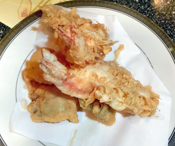Crispy tempura prawns.