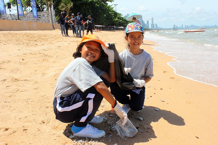 A pair of sunscreen wearers do their part to help the environment.