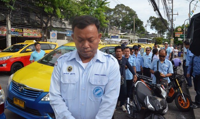Police have warned Somkiet Phusuwan and other taxi drivers to stop taking vigilante-style action to inflict street justice on those they suspect of driving for Uber and leave the policing to authorities.