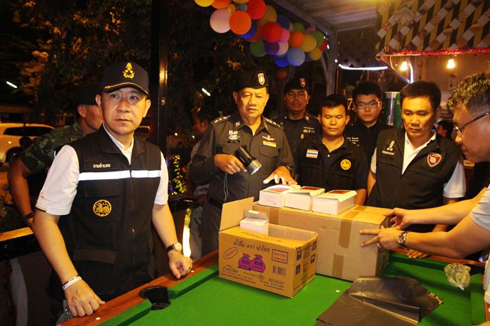 16 people were arrested when police and soldiers raided two Pattaya pubs catering to Thais.