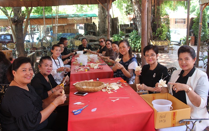 The Pattaya Women’s Development Club has joined the effort to create artificial flowers for the cremation of HM the late King.