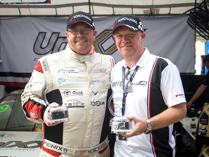 Danish driver Thomas Raldorf (left) poses with his trophy alongside UNIXX – TR-Motorsport’s Brand Marketing & Commercial Manager Earl Brown during the Bang Saen Speed Festival in Bang Saen, Chonburi.