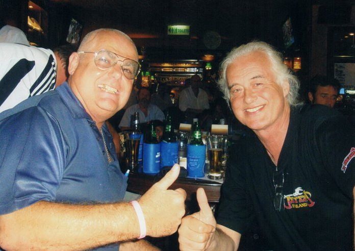 Mott the Dog (left) breaks bread with Led Zeppelin guitar legend Jimmy Page at Jameson’s Irish Pub in Pattaya.