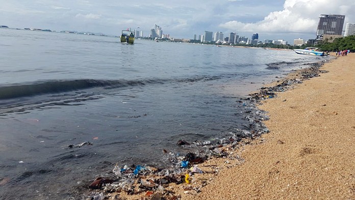 Citizens, residents and tourists alike took to social media to post images of black sand and inky, smelly water on Pattaya Beach near the old pier site near Walking Street. It’s not the first time this has happened. A storm drainage pipe near the site has seen multiple repairs to traps and doors that prevent sewage outflows. It’s possible it is broken again. Cleanup began July 15 and officials predicted it would take about a week to clean the beach of raw sewage that backed up and flowed into the sand and sea following a recent heavy storm.
