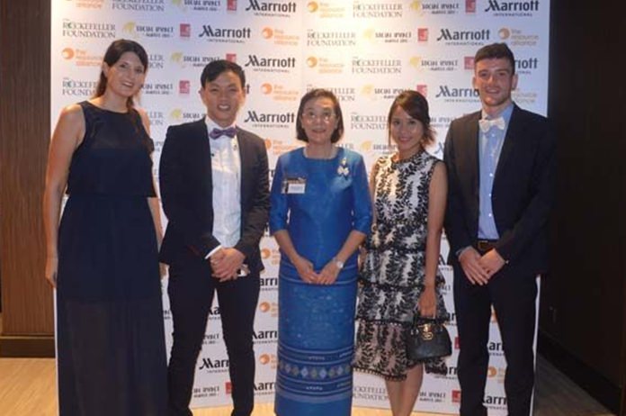 The HHNFT Team at the Gala Dinner: (from left) volunteer Hannah Heichen, Drop-In Manager Piroon Noi-Imjai, Director Radchada Chomjinda, Outreach Chief Thitiporn Saknarong, and volunteer Christian Frick.