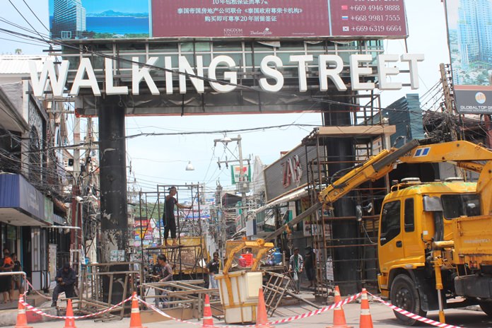 Pattaya workers perform the first major repairs on Walking Street’s mammoth LED sign since it was installed nine years ago.