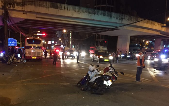 A motorcyclist died and two others hurt when they were struck by a tour bus (back, left) when the bus brakes reportedly failed.