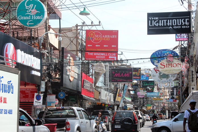 City fathers say the signs hanging over Walking Street pose obstacles to emergency vehicles and should be removed. No mention was made of the low hanging wires that cause more problems for emergency vehicles, as the photo clearly shows.