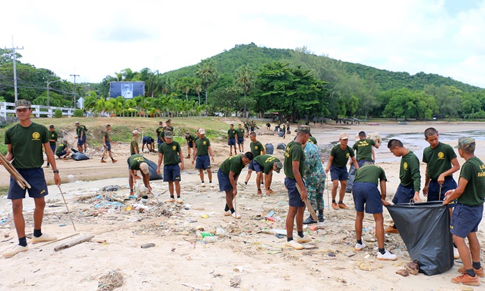Sailors cleaned Had Tien Beach after a tidal wave of garbage washed ashore.