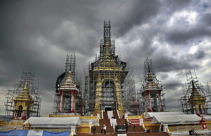 Dark clouds loom over the construction of the royal crematorium for HM the late King Bhumibol Adulyadej at Sanam Luang in Bangkok. The crematorium is built to represent Mount Meru, a place god resides according to Buddhist and Hindu legends.