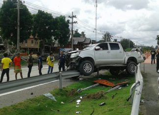 Two people were hurt when their Toyota pickup slammed into a metal post after the driver apparently fell asleep.