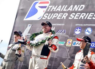 Danish driver Thomas Raldorf (center) celebrates on the podium after winning Race 2 of the Thailand Super Series weekend in Buriram, Sunday, August 20.