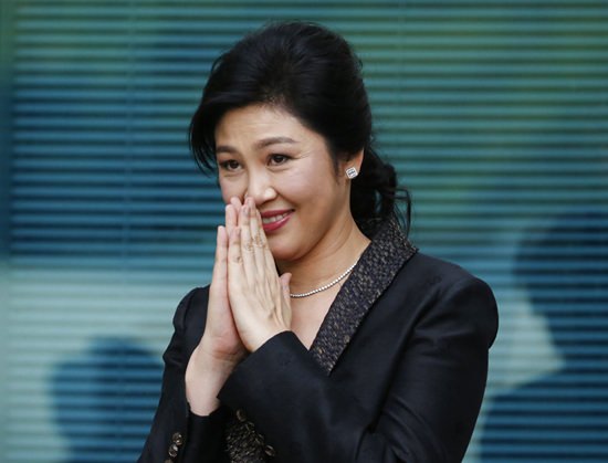 In this Aug. 1, 2017 file photo, Thailand's former Prime Minister Yingluck Shinawatra arrives at the Supreme Court for to make final statement of the hearing in Bangkok, Thailand. (AP Photo/Sakchai Lalit, File)