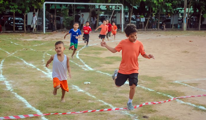 Young athletes sprint for the finish line.