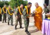 Military personnel receive a Buddhist amulet to give them courage and keep them safe in the Far South.