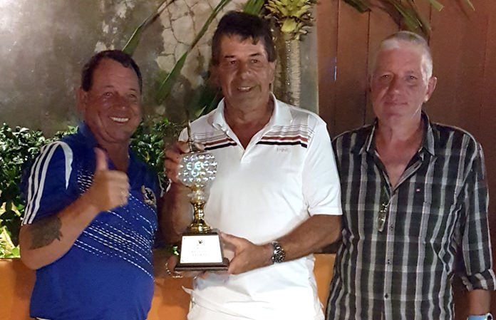 Trevor Oliver (centre) accepts the King of the Mountain trophy from Derek Thorogood (left) and Jim Cooper.