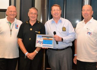 MC Roy Albiston poses with Rotary Club Eastern Seaboard members (l to r) Jan Abbink, Carl Dyson, and Brian Songhurst, after presenting them with the PCEC’s Certificate of Appreciation.