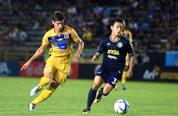 Pattaya United’s Picha U-Tra (right) and Port MTI FC’s Sergio Suarez (left) vie for the ball during their team’s Thai Premier League fixture at the Nongprue Stadium in Pattaya, Sunday, Sept. 24. Turn to page 32 for a full match report. (Photo/Pattaya United FC)