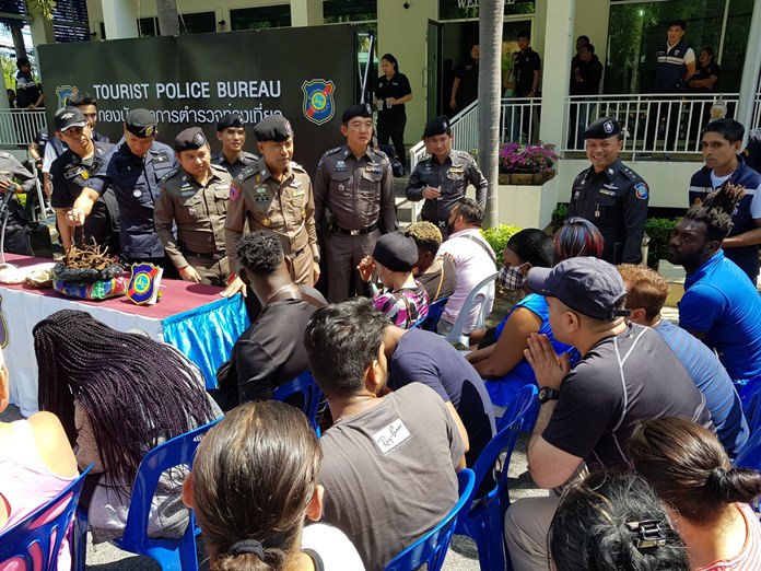 Special Branch and Immigration police raided a dozen spots in Pattaya, arresting 18 foreign fugitives and suspected criminals.