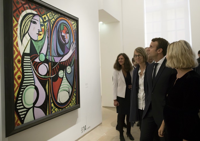 France’s President Emmanuel Macron visits the “Picasso 1932: Erotic Year” exhibition at the Picasso museum in Paris, Sunday, Oct. 8. (Ian Langsdon/pool photo via AP)