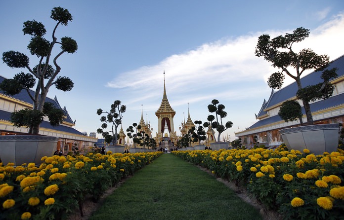 Beautiful marigolds lead the way towards the grand pavilion. (AP Photo/Sakchai Lalit)