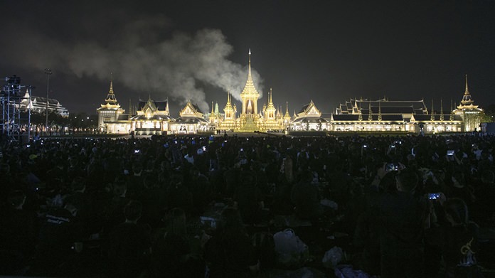 Smoke rises from the royal crematorium during the final cremation of HM the late King Bhumibol Adulyadej. (AP Photo/Wason Wanichakorn)