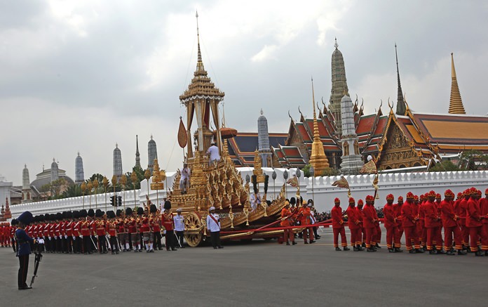 The symbolic urn is transported aboard the Royal Chariot during the funeral procession of late King Bhumibol Adulyadej in Bangkok, Thursday, Oct. 26, 2017. (AP Photo/Wason Wanichakorn)