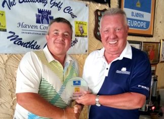 Richard Steadman (left) receives his medal.