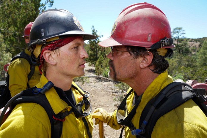 This image shows Miles Teller (left) and Josh Brolin in a scene from “Only the Brave.” (Richard Foreman Jr./Sony Pictures via AP)