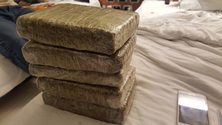 Sanya “Tamarind Tree Agent” Sae-uey was arrested for possession of five kilos of marijuana.