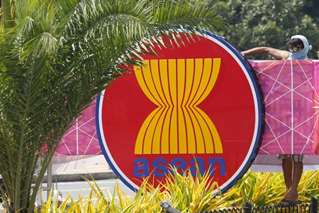 A worker puts finishing touches on an ASEAN logo for the ASEAN leaders’ summit and related summits Monday, Nov. 6, 2017 in suburban Pasay City, southeast of Manila, Philippines. ASEAN leaders and its dialogue partners such as the United States, Russia, China, Japan, South Korea, India, Australia, Canada, New Zealand, the European Council and U.N. Secretary-General Antonio Guterres attended the summit. (AP Photo/Bullit Marquez)