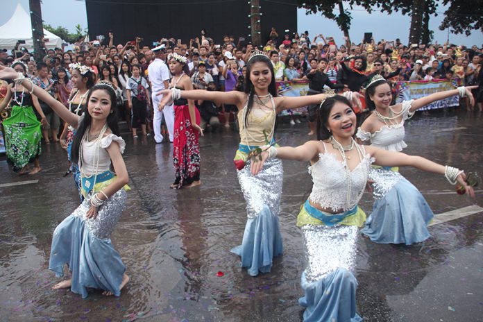 Representatives of tourism businesses in and around Pattaya parade in full color.