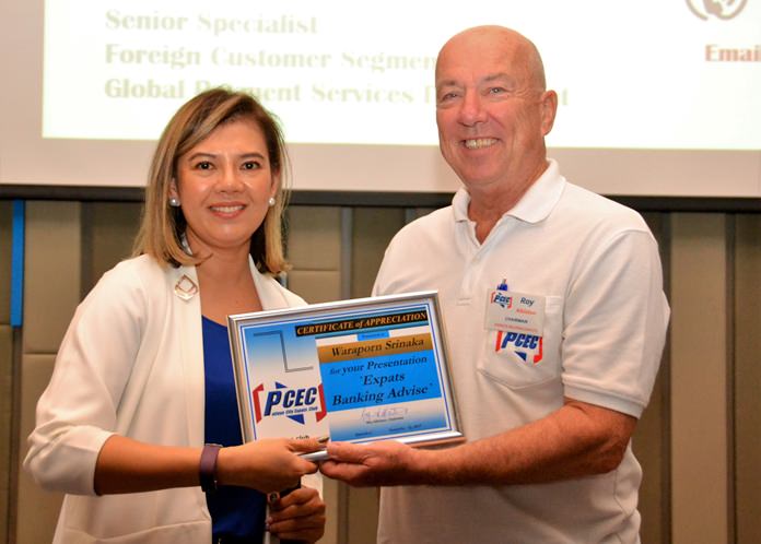 MC Roy Albiston presents the PCEC’s Certificate of Appreciation to Waraporn for her informative talk and advice on Expat banking in Thailand.