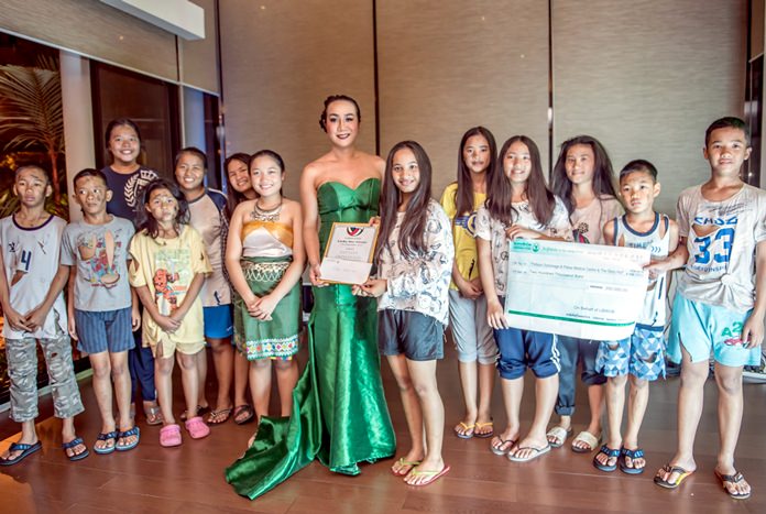 After putting on a special performance, the children from the Pattaya Orphanage were presented with a 200,000 baht check which will go towards their education, daily expenses and more.