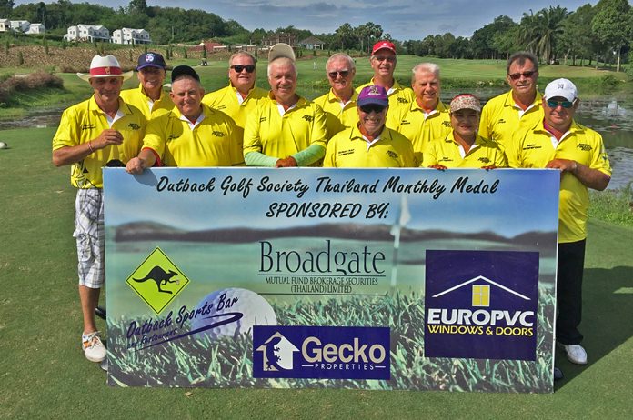 The twelve monthly finalists pose for a group picture.