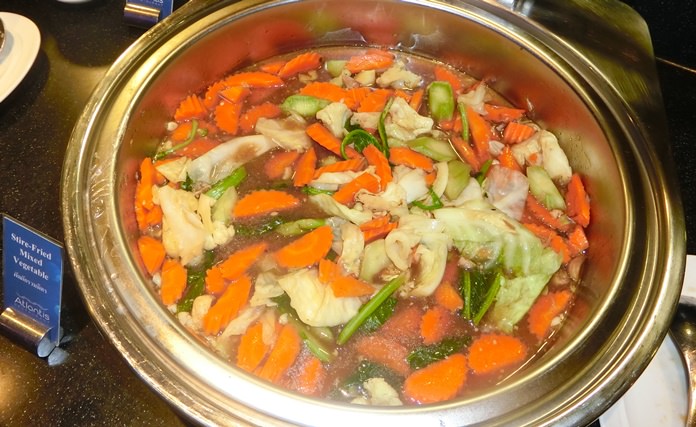 Stir fry mixed vegetables.