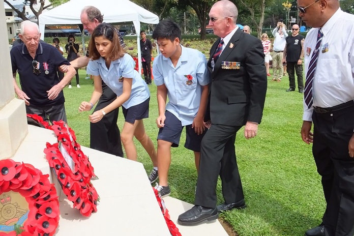 GIS students lay a wreath on behalf of the school at the War Cemetery in Kanchanaburi.