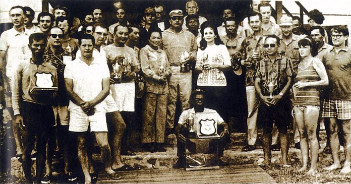 This photo from 1970 shows a group of prize winners with their trophies after a round the islands race at Varuna.