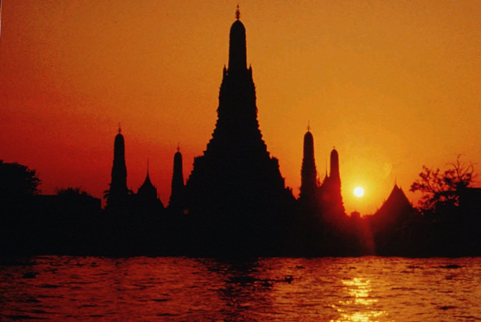Wat Arun or the "Temple of Dawn" is seen from across the banks of the Chao Phraya river in Bangkok. (AP Photo/Sakchai Lalit)