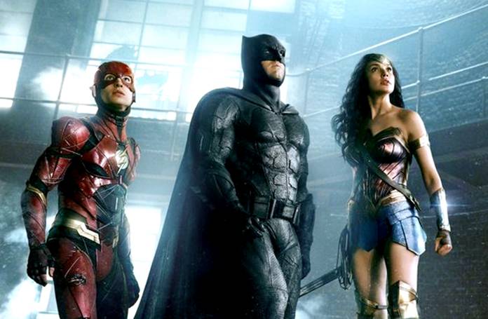 This image shows Ezra Miller (from left) Ben Affleck and Gal Gadot in a scene from “Justice League.” (Warner Bros. Entertainment Inc. via AP)