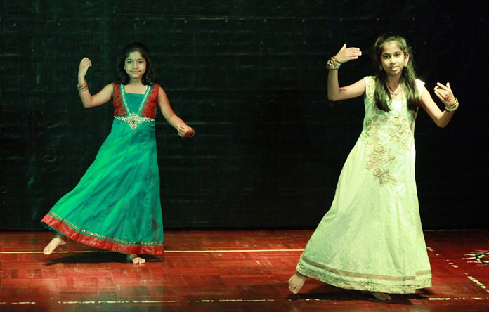 A pair of GIS students perform at Diwali.