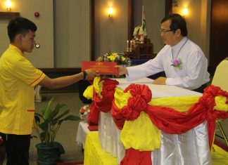 Father Michael Picharn Jaiseri presented the sixty nine graduation certificates.